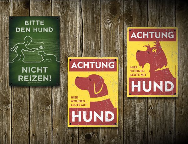 Schild Hundeerziehung und zwei Hundewarnschilder